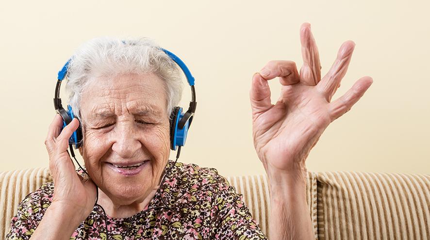 Senior woman listening to music.