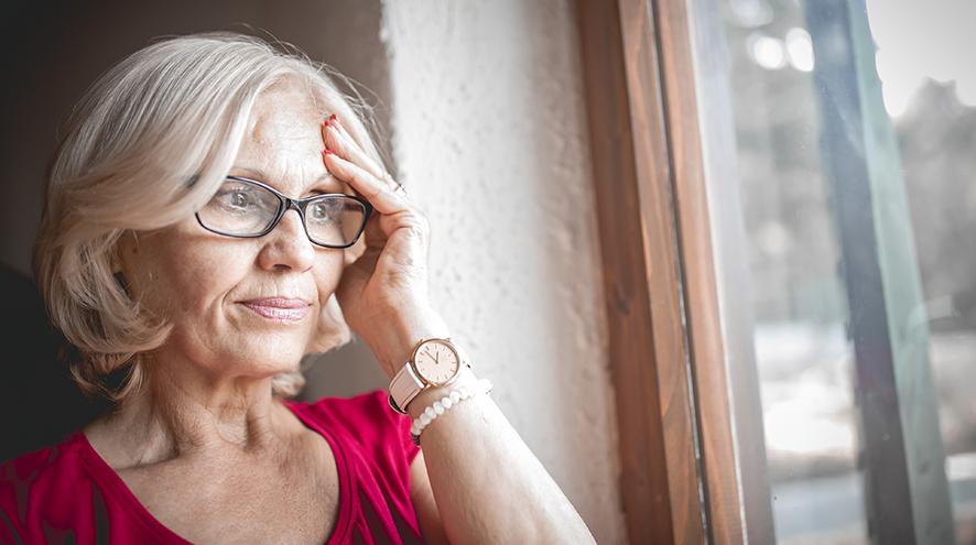 Senior woman thinking, looking worried.