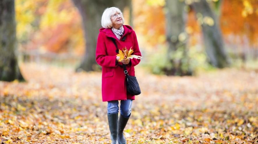 Senior woman on an autumn walk.
