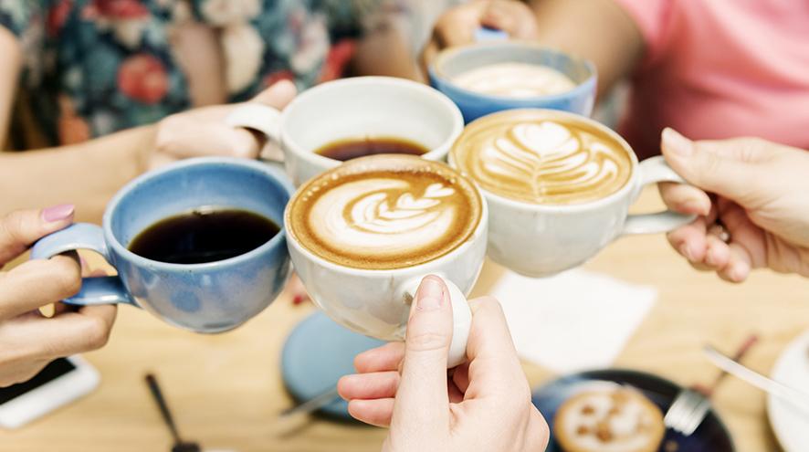 Group of friends enjoying coffee together.