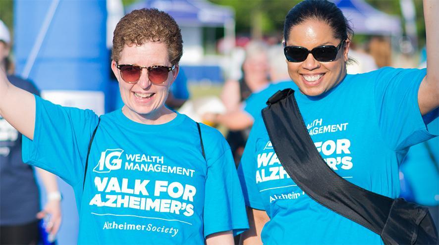 Two friends participating in the IG Wealth Management Walk for Alzheimer's.