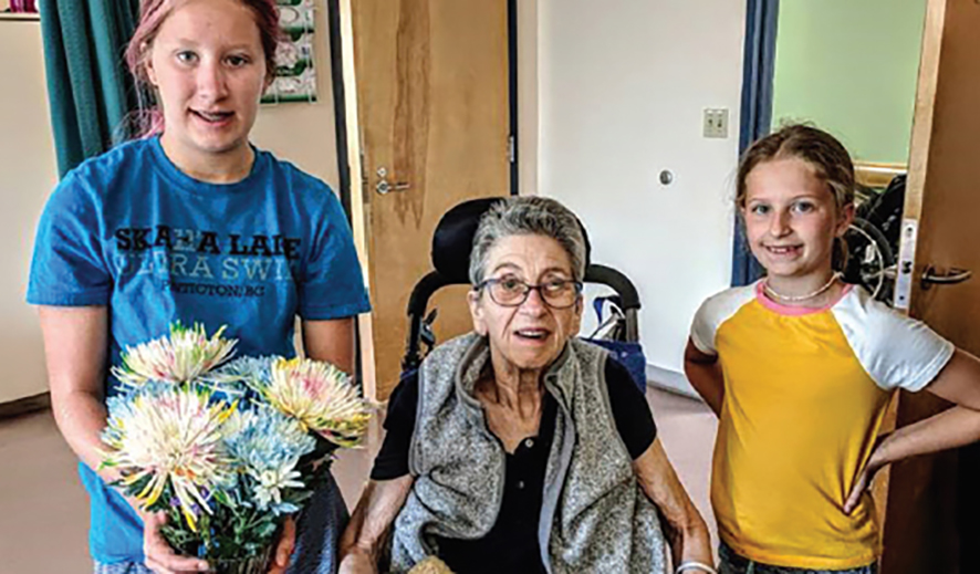 Issie Grecoff (left) with grandmother Joan Wickett and sister Sara.
