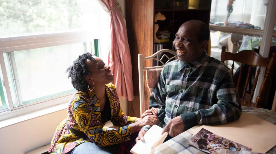 One of the lead investigators, Ngozi, shares a happy moment with her father who lives with dementia.