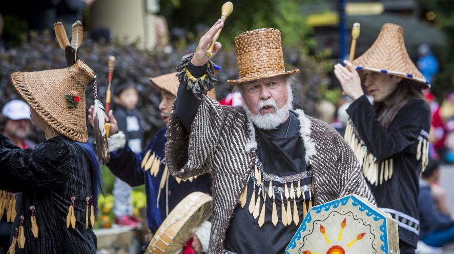 Senior man participating in an indigenous celebration.